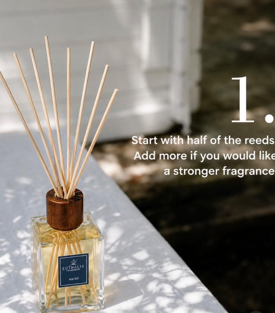 Start with half of the reeds. Add more if you would like a stronger fragrance.